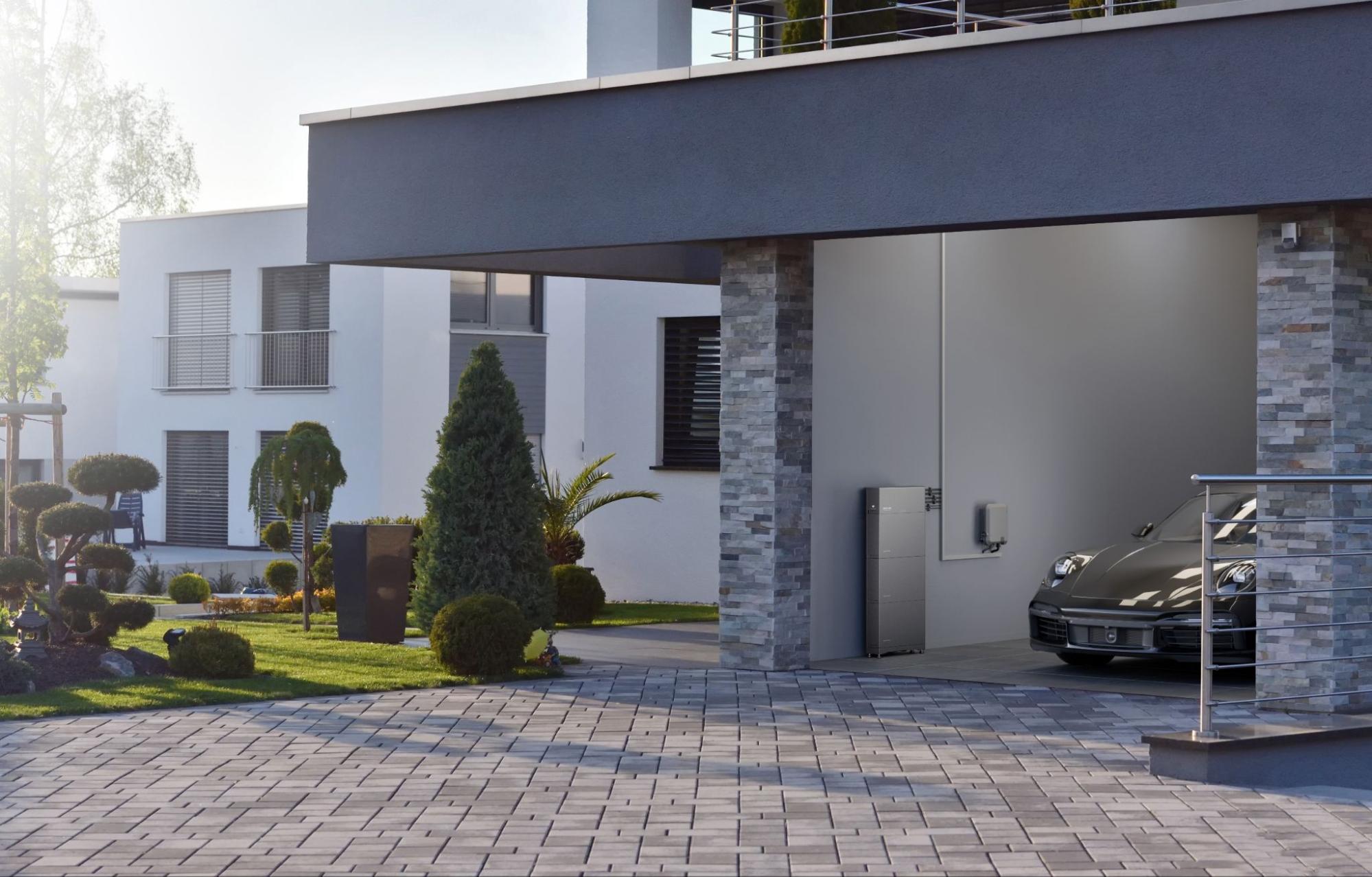 House with garage and PowerOcean DC Fit installed on wall